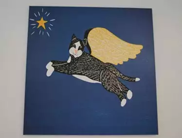 Painting of a cat with angel wings